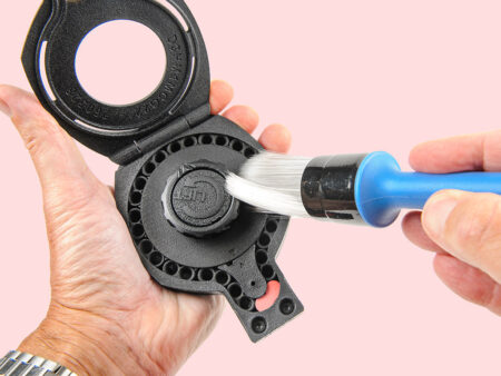 Cleaning the Daystate Quantum Hi-Capacity Magazine with a soft-bristle brush - part of its maintenance programme